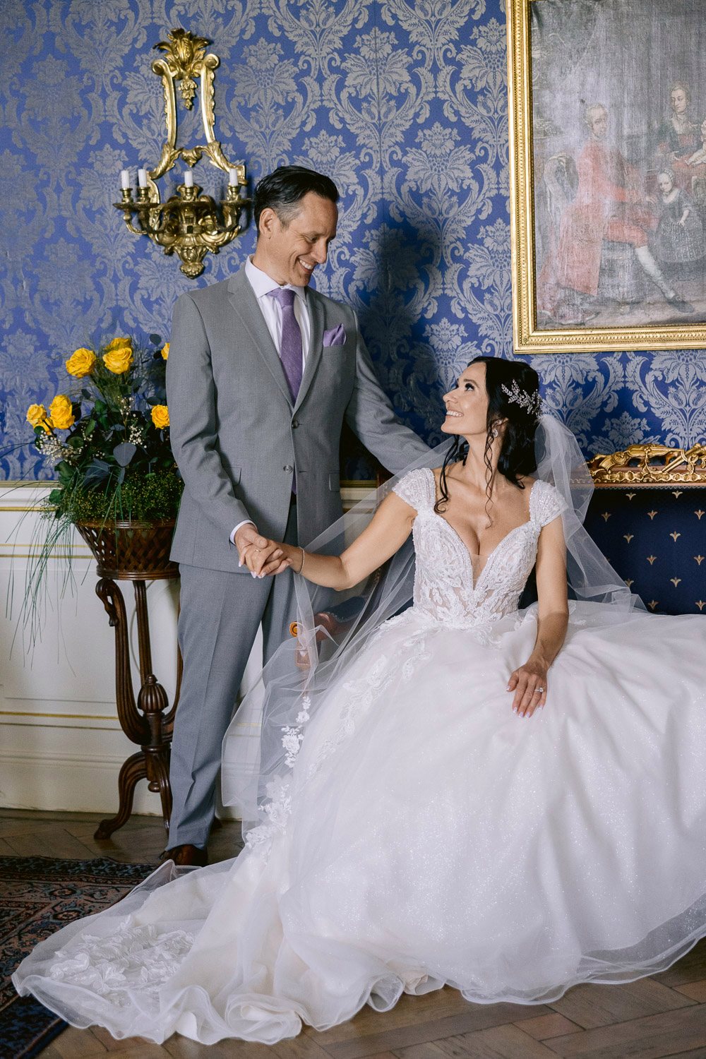 Chateau Mcely Couple Blue Salon Bride and groom in the blue salon at Château Mcely
