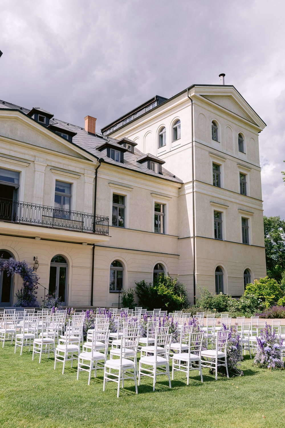 Chateau Mcely Garden Ceremony Setup Outdoor ceremony set-up on the lawn in front of the château
