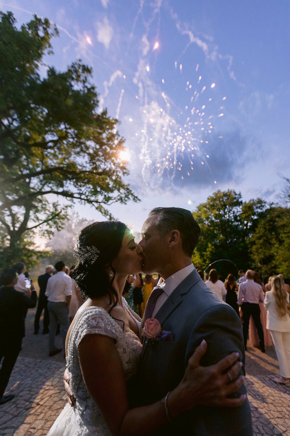 Chateau Mcely Wedding Fireworks Kiss Bride and groom kissing under fireworks