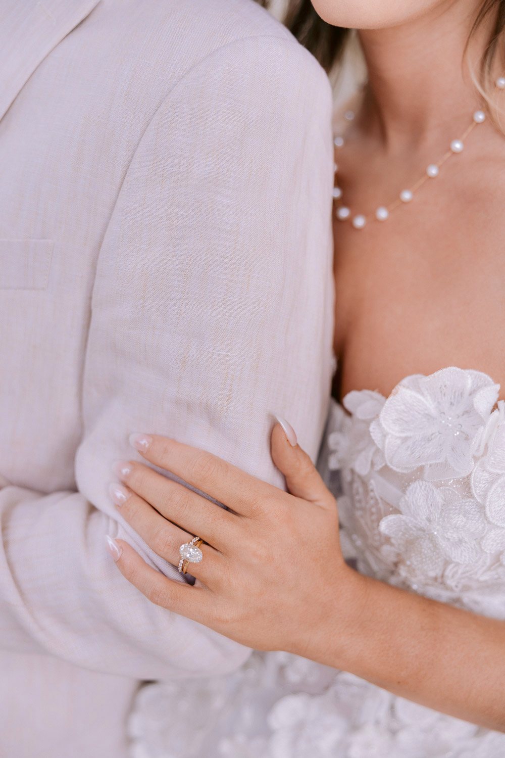 Lobkowicz Palace Elopement Bride Hand Ring Detail Bride's hand with her ring on the groom's arm