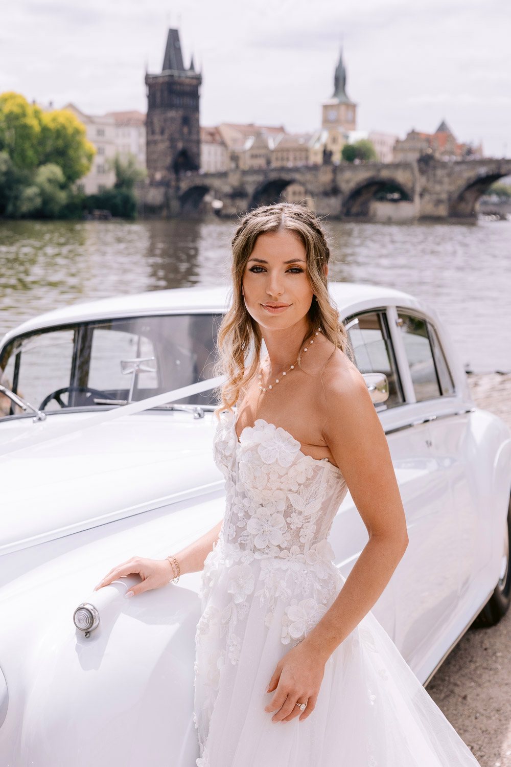 Lobkowicz Palace Elopement Bride Leaning Rolls Royce Bride leaning on the vintage Rolls-Royce