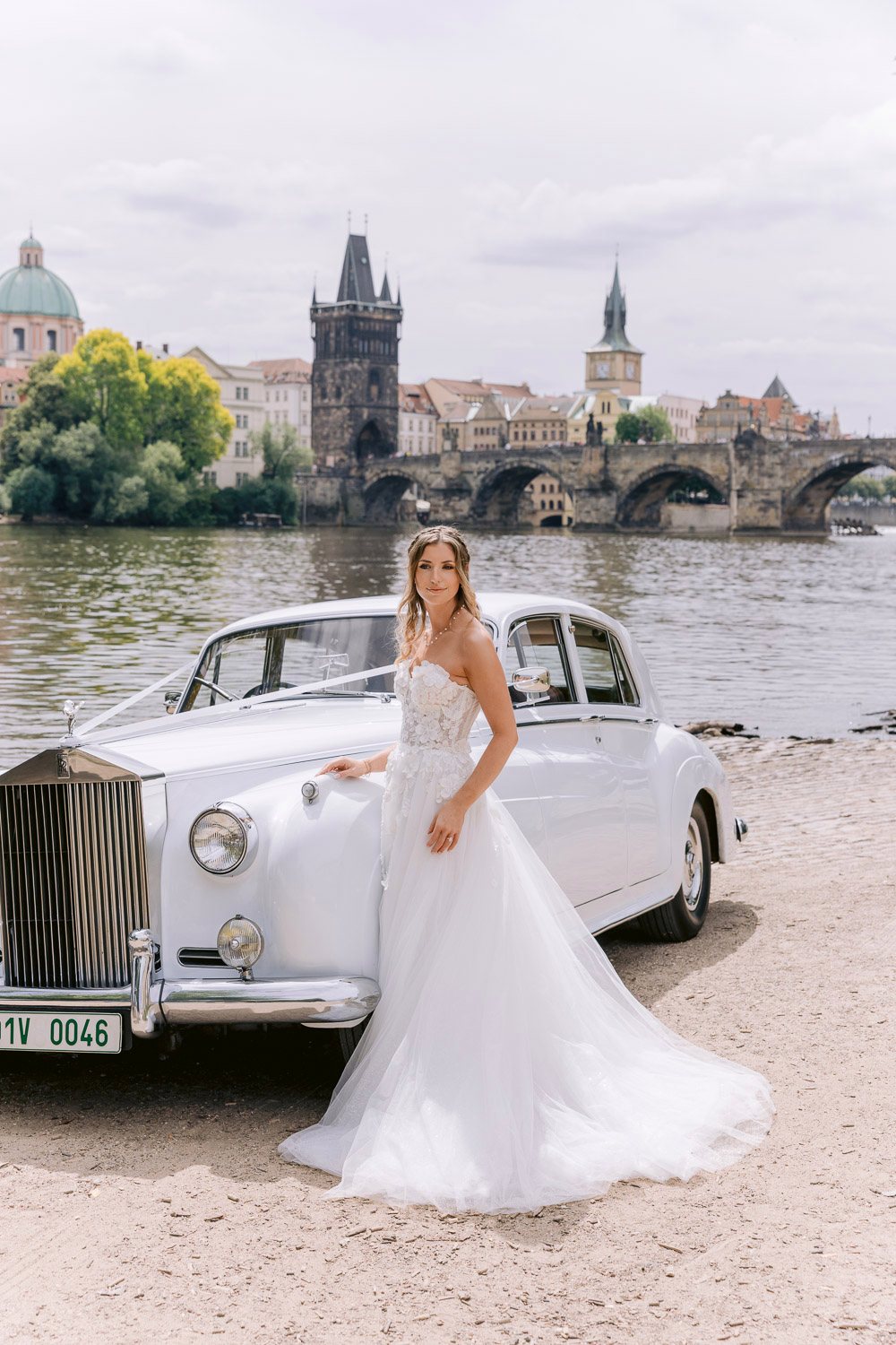 Lobkowicz Palace Elopement Bride Rolls Royce Charles Bridge Bride by the Rolls-Royce with Charles Bridge behind