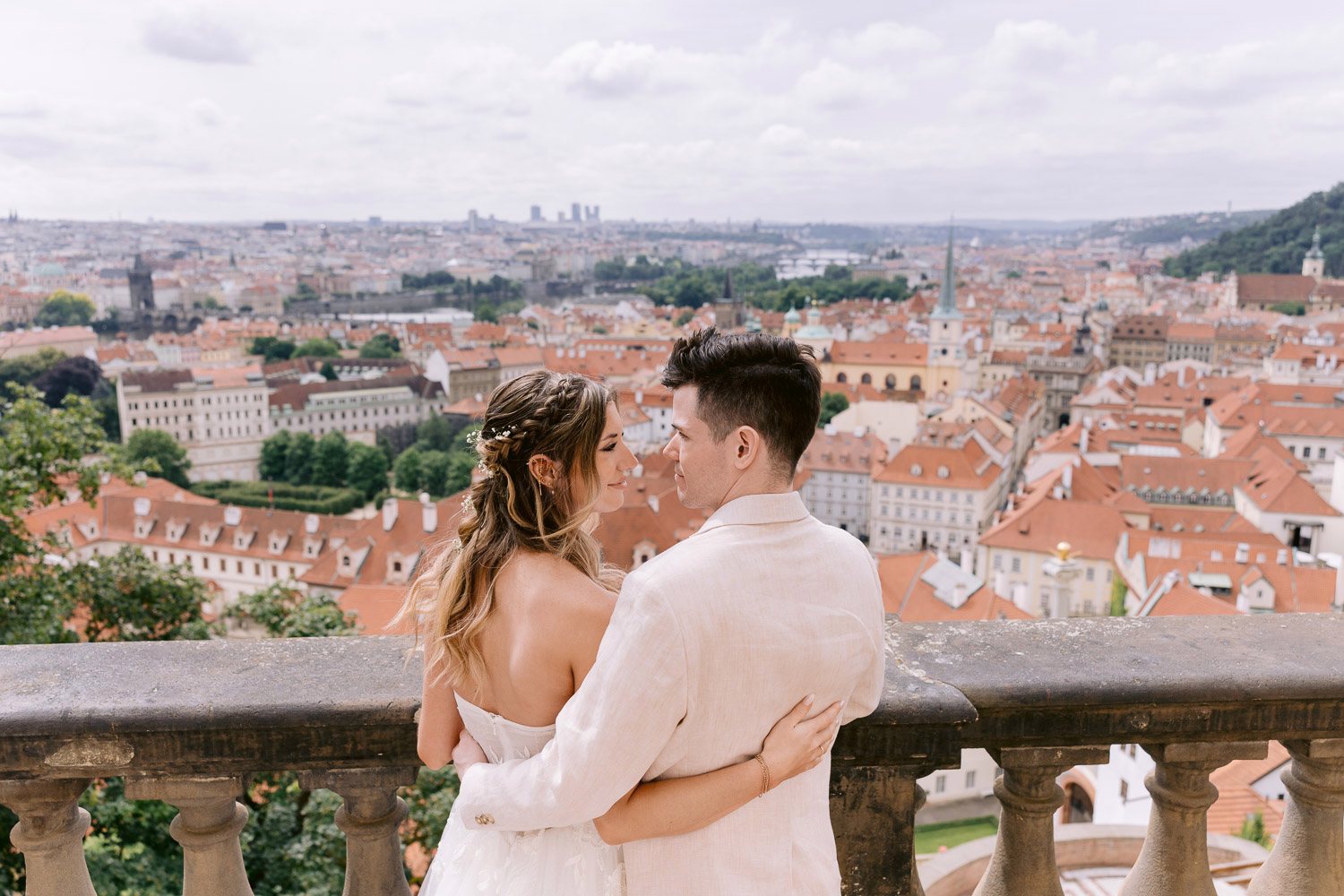 Lobkowicz Palace Elopement Couple Overlooking Prague Newlyweds overlooking the rooftops of Prague from Lobkowicz Palace