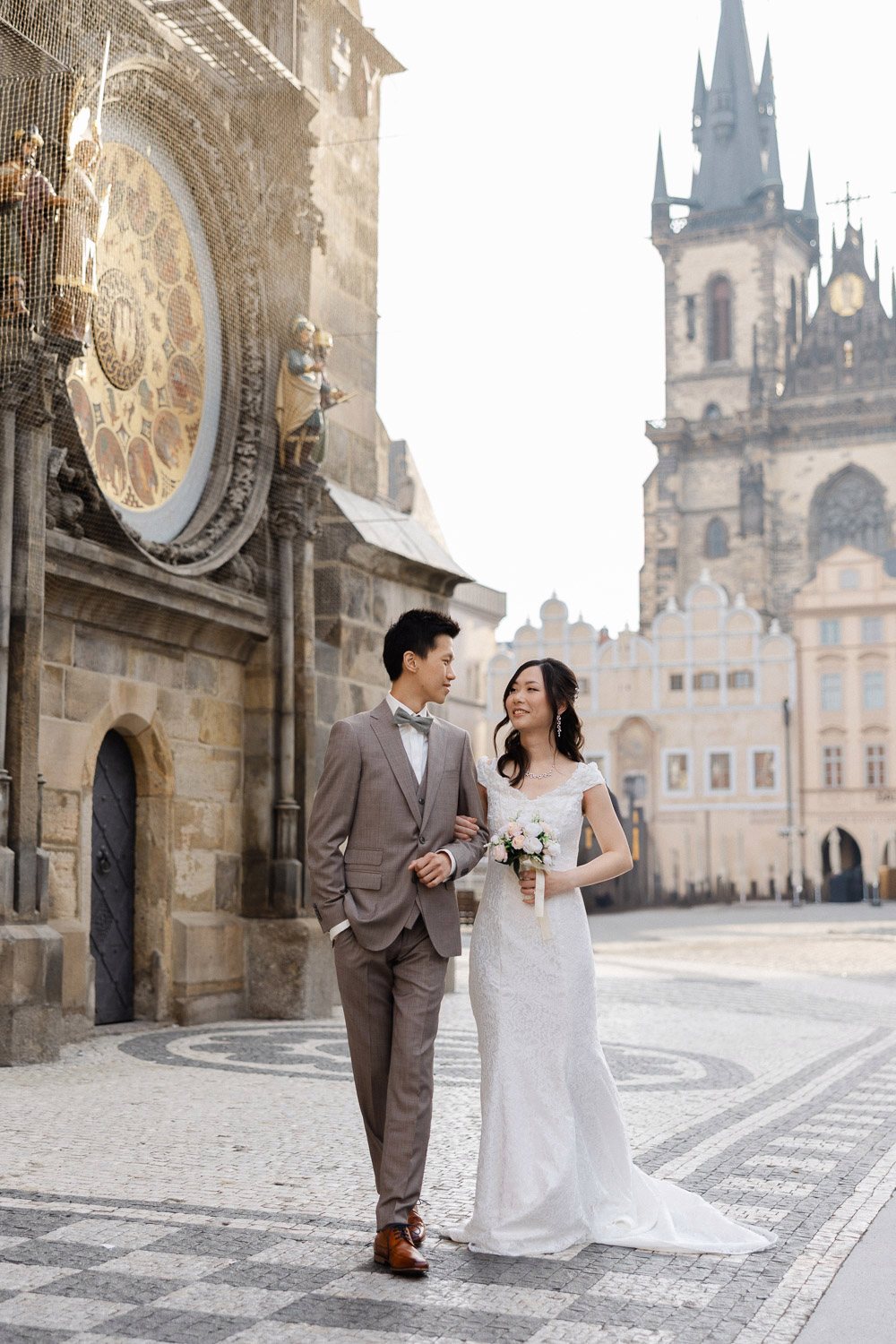 Couple at the Old Town Hall with Týn Church behind, Prague