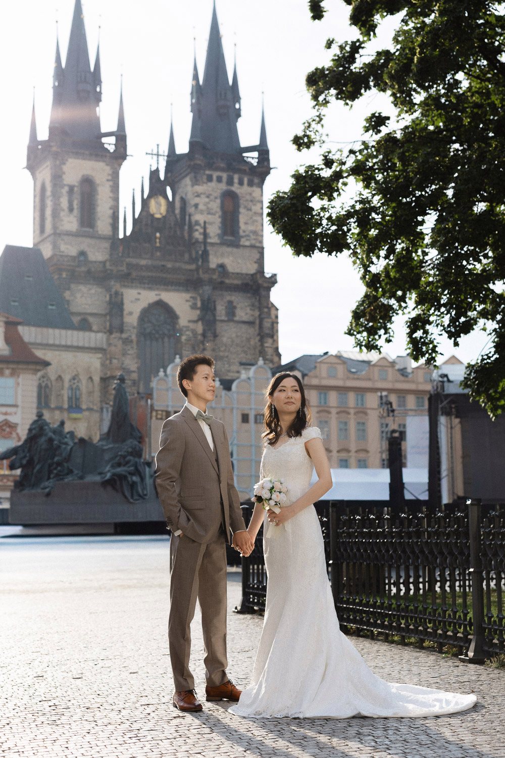 Couple in Old Town Square in front of Týn Church
