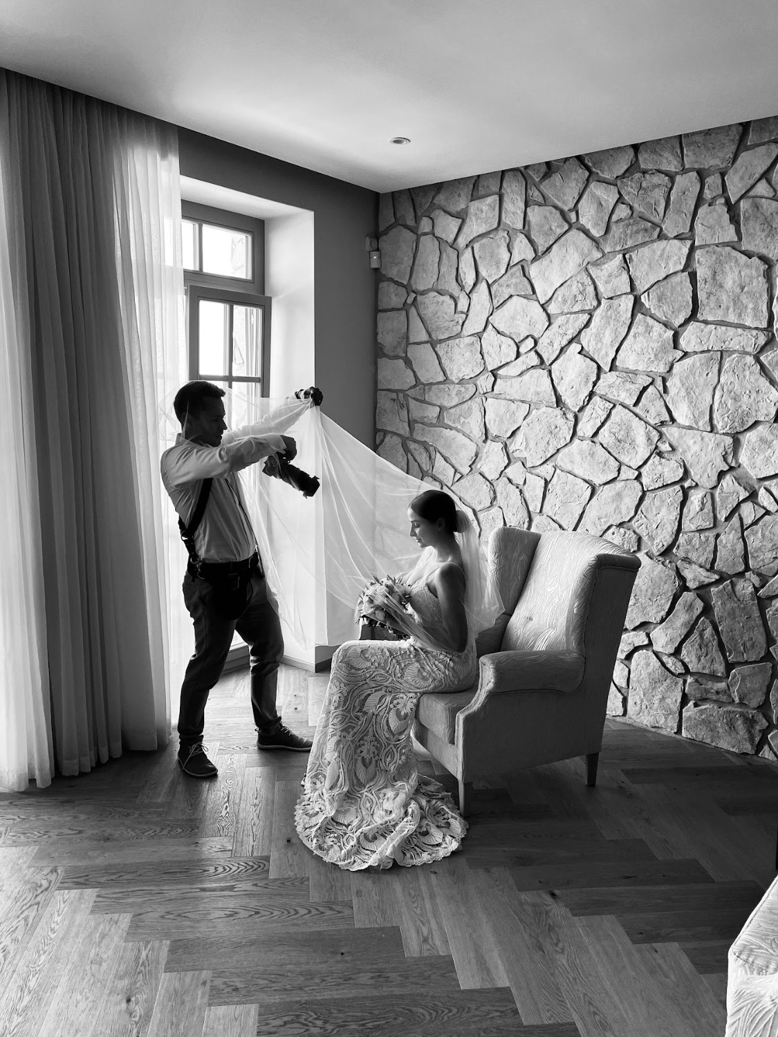 Review Adela Behind The Scenes Peter Rigo Peter Rigo photographing a bride by the window, black and white