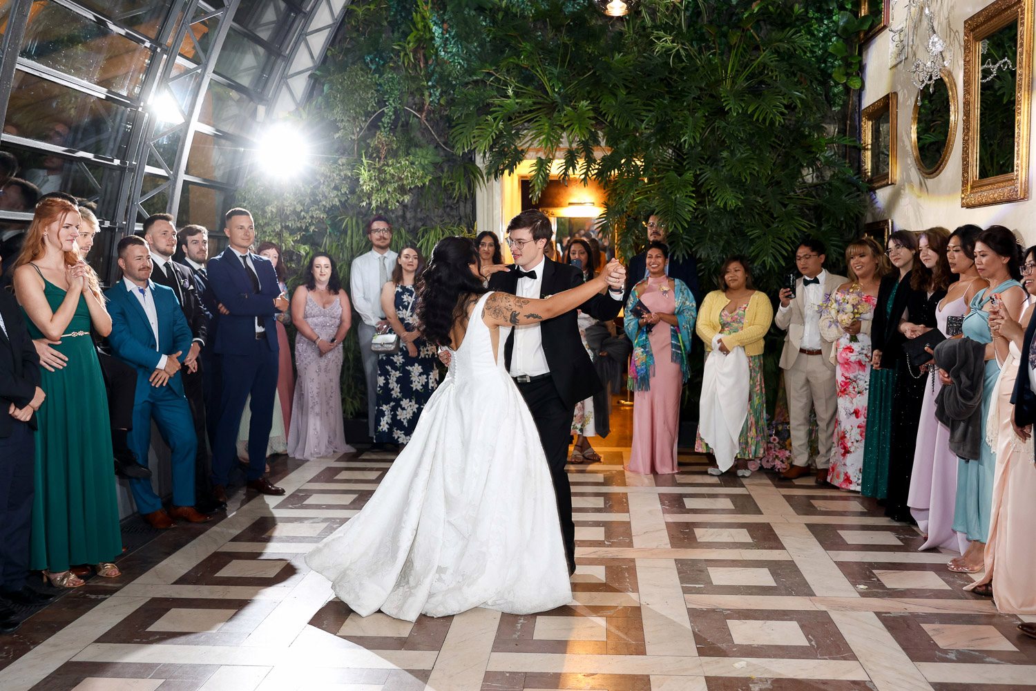 Villa Richter First Dance Guests Glasshouse Guests surrounding the couple during the first dance