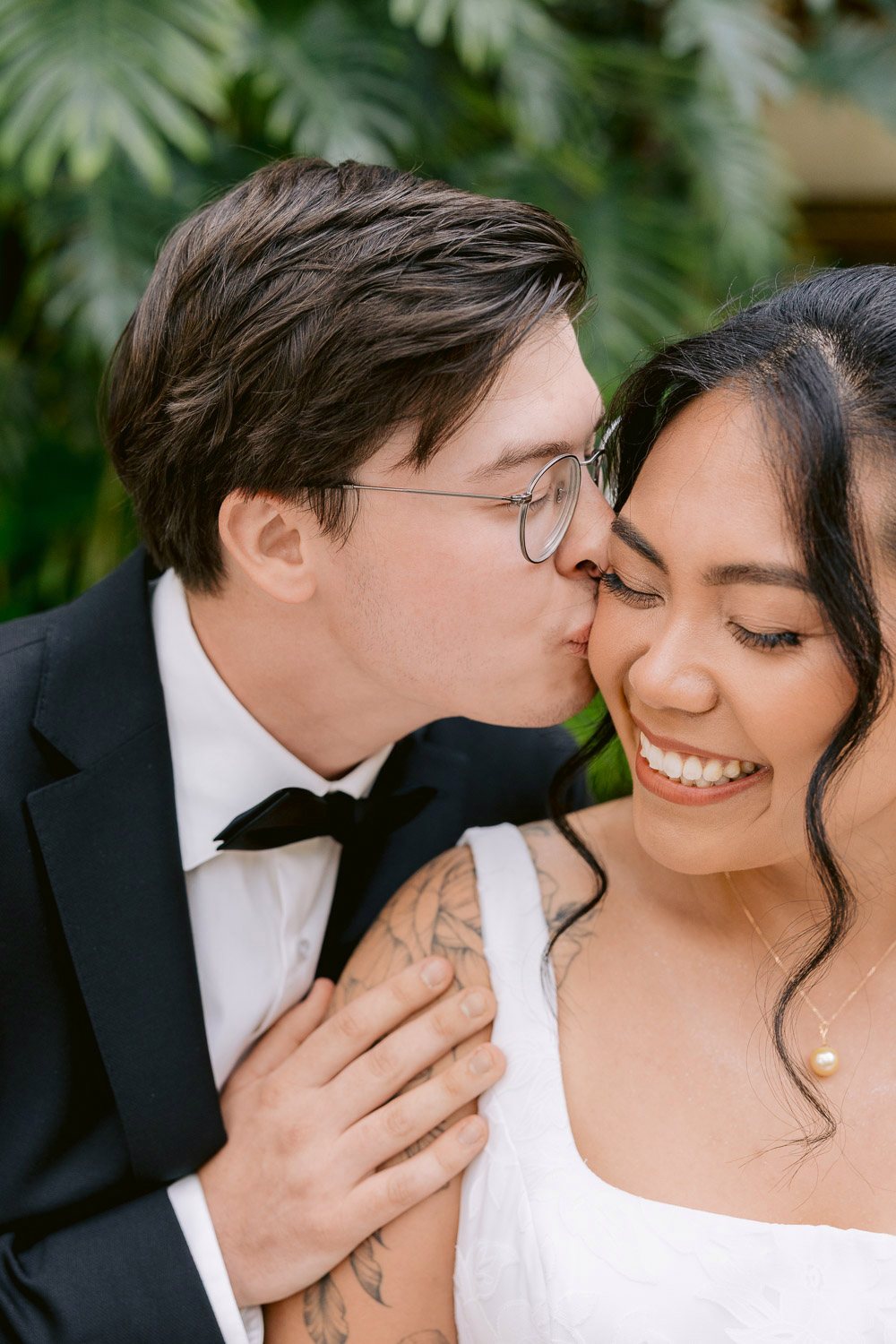 Villa Richter Groom Kisses Bride Cheek Groom kissing the bride on the cheek