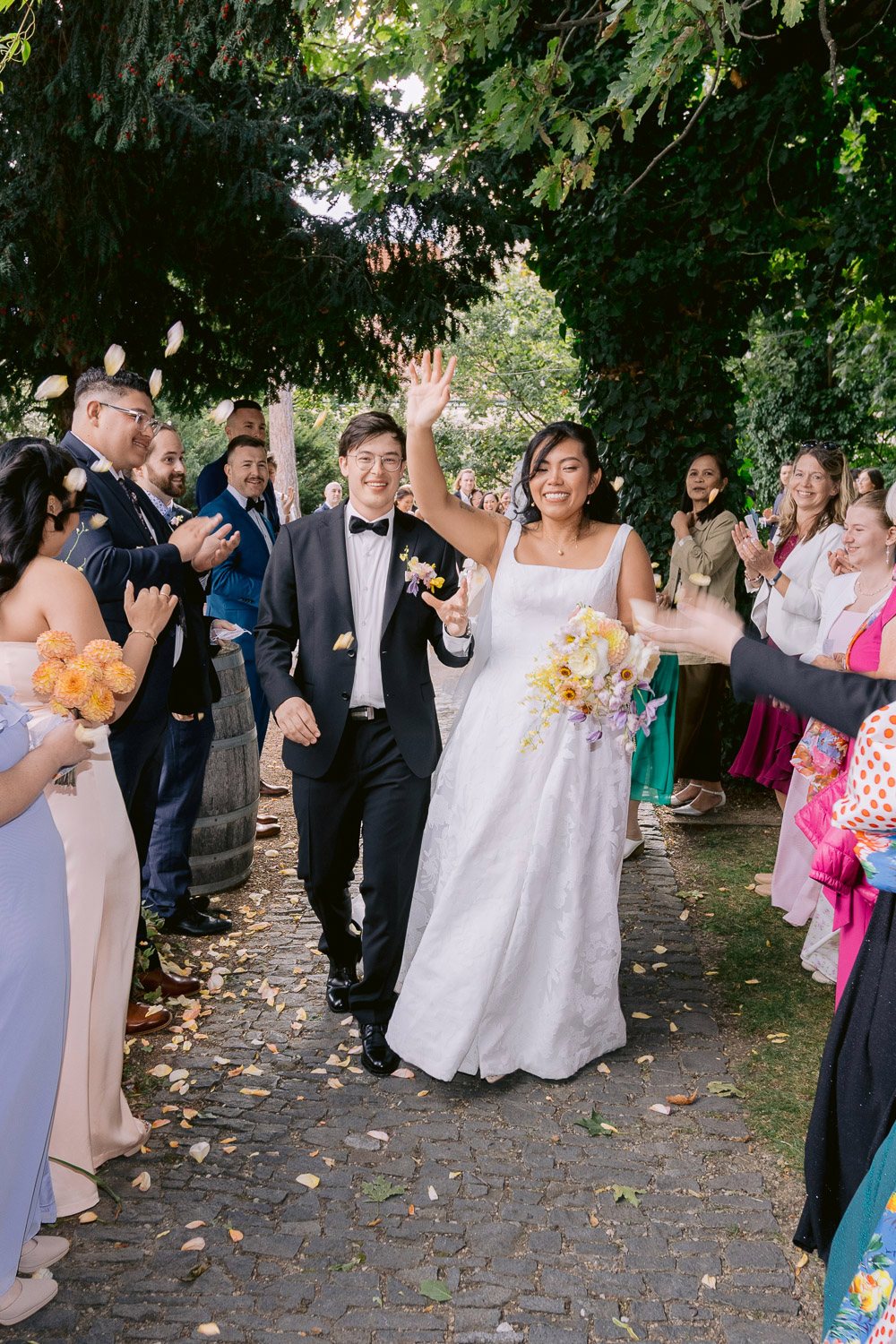 Villa Richter Recessional Guests Cheering Guests cheering as the newlyweds walk back up the aisle