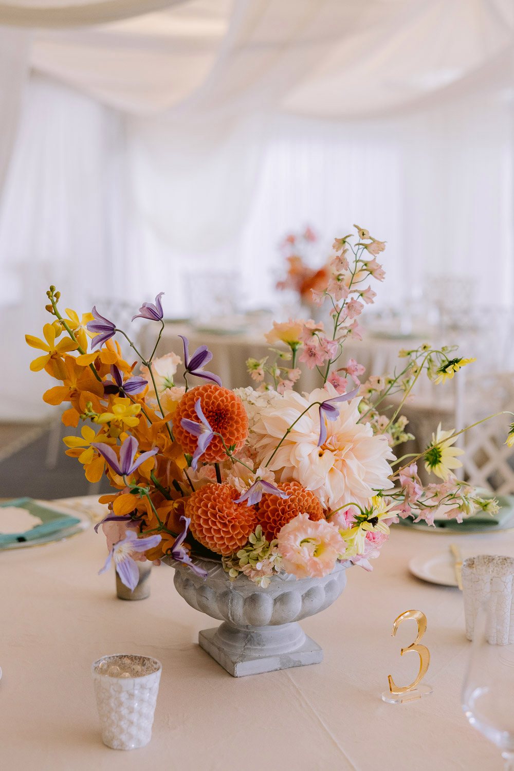 Villa Richter Wedding Centerpiece Flowers Orange and peach flower centrepiece